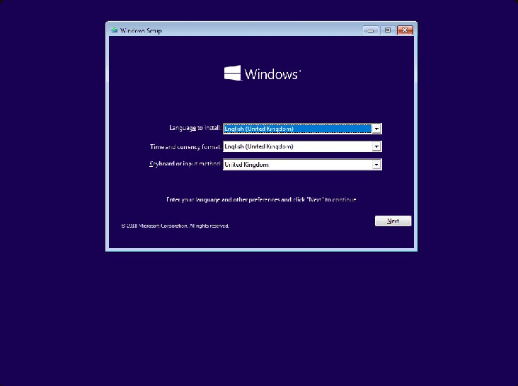 Windows 安装向导：选择语言和区域设置后点击"下一步"